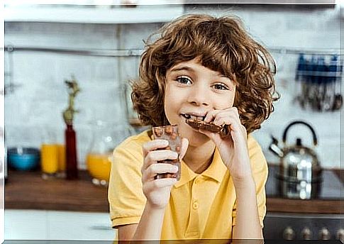 child eating chocolate 