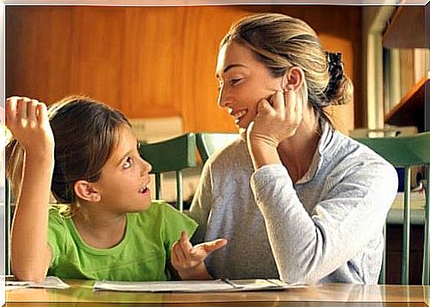 mother-helps-daughter-in-school-homework