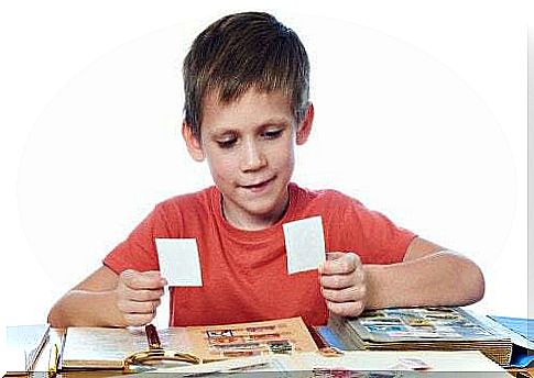 Child collects a sticker album.