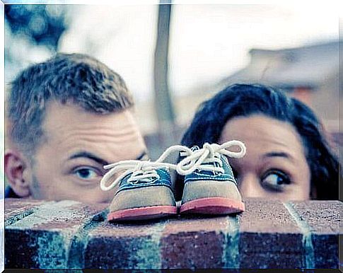 Parents looking at shoes