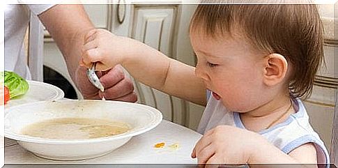 Child eating soup