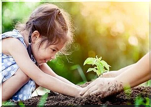 little girl gardening