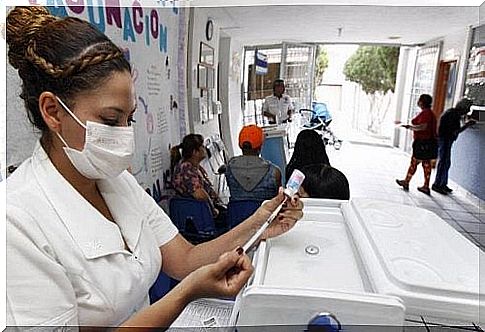 Nurse prepares a syringe