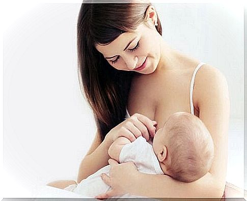 Mother breastfeeding her child