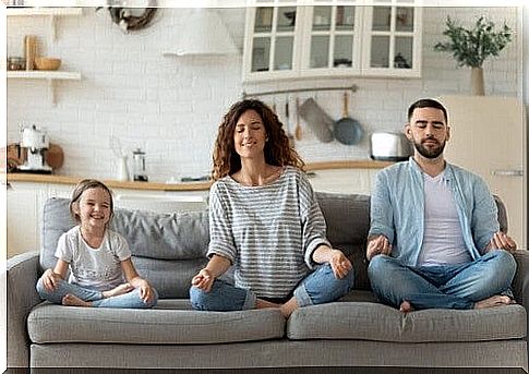 Family doing meditation