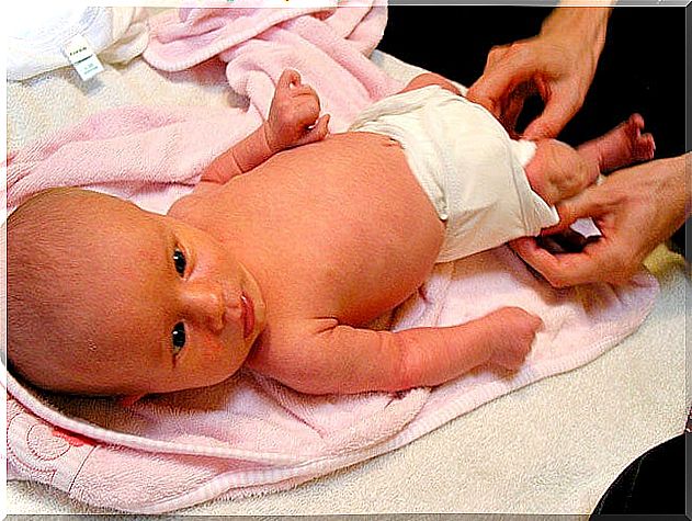 baby cleaned with wet wipes