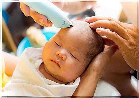 When should baby's hair be cut for the first time?