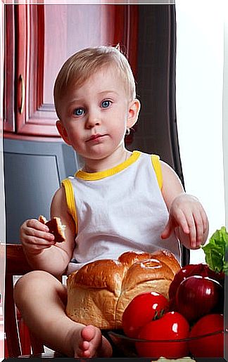 child eating bread